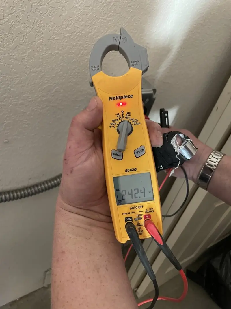 Voltage testing with clamp meter during Generator Installation in Mineral Springs